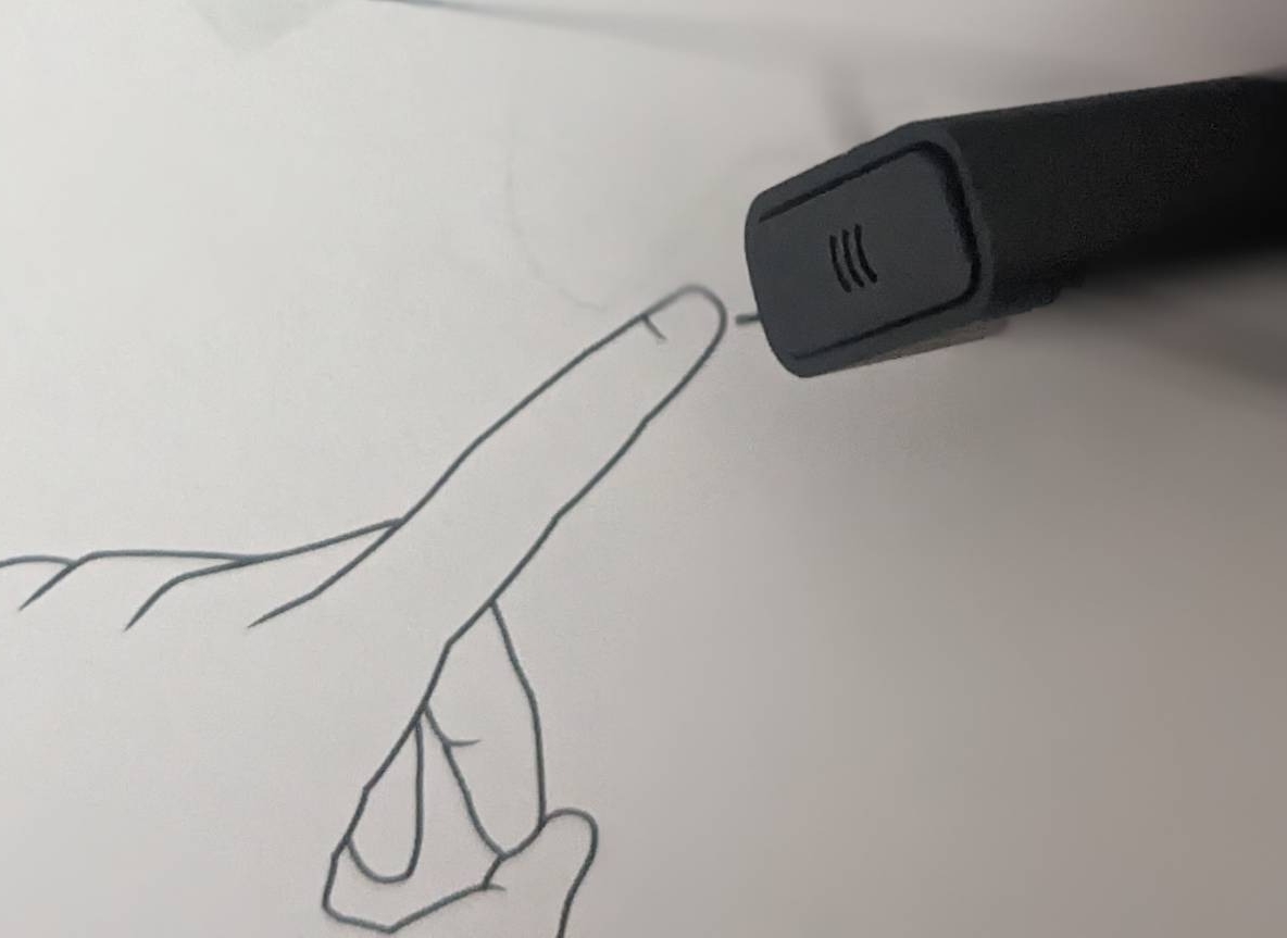 Image shows the pairing button on the adapter